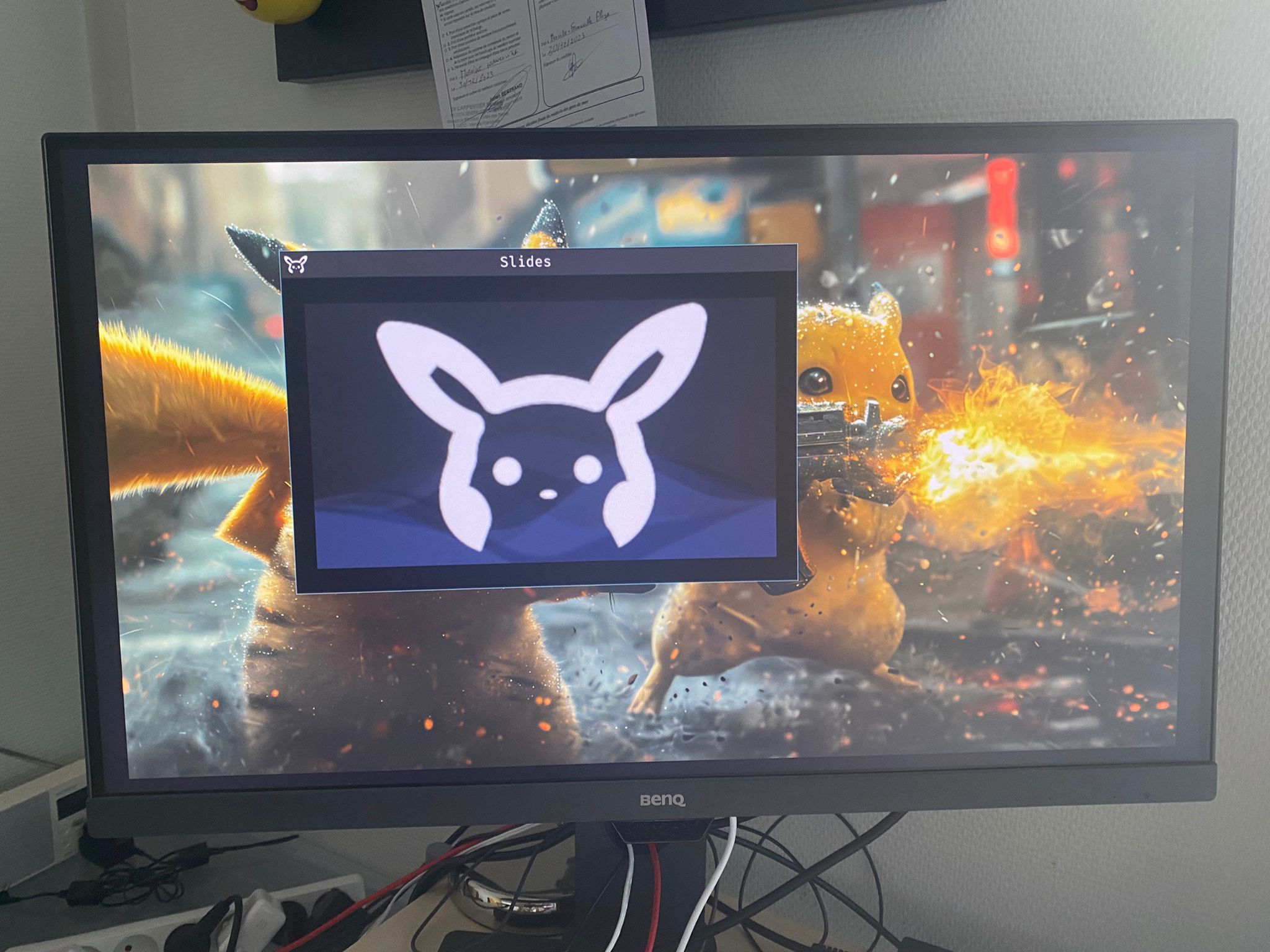 Photo of our OS displaying our slides on a screen.
